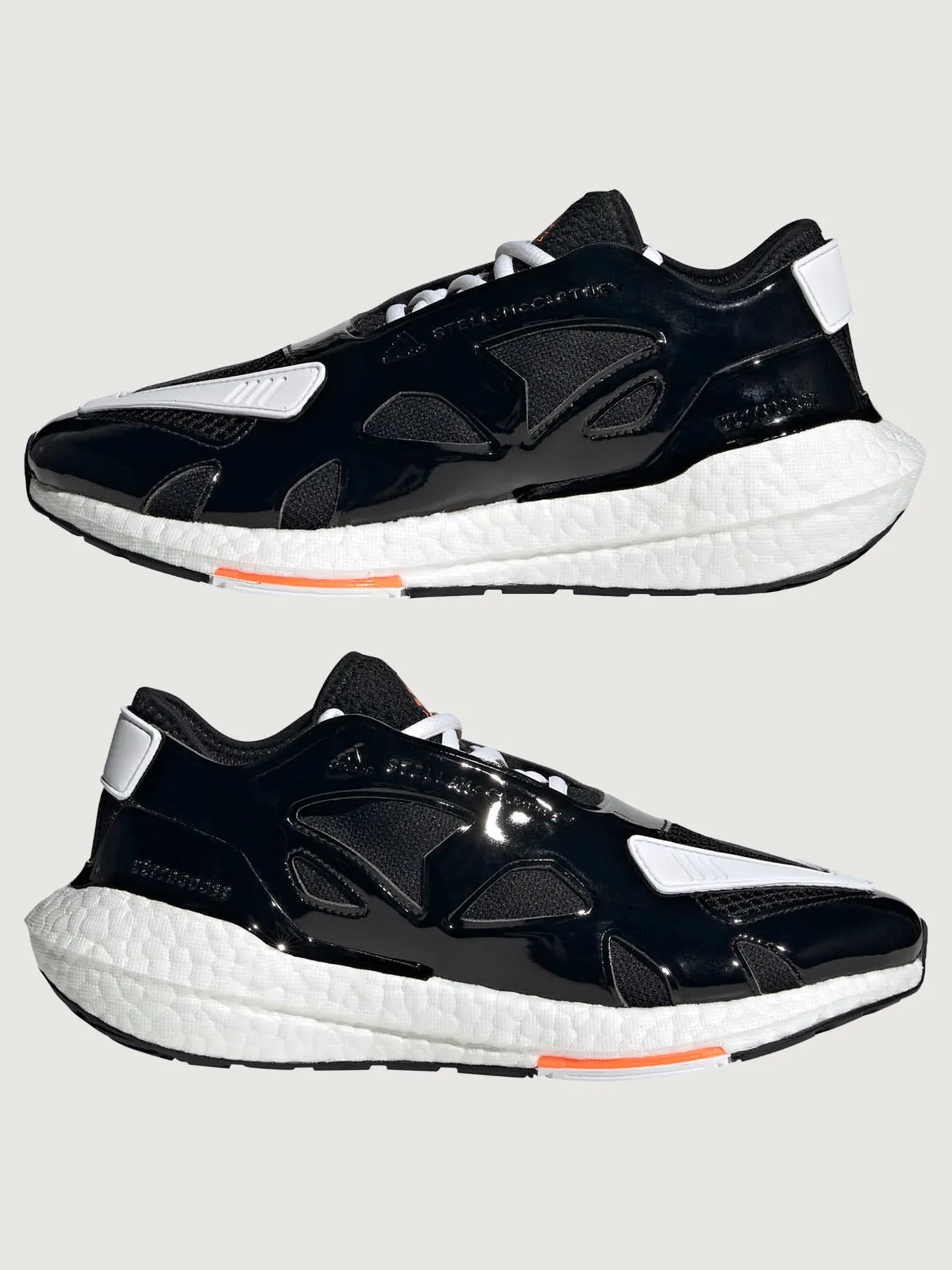 adidas by Stella McCartney ULTRABOOST 22 - CORE BLACK/FTWR WHITE/SIGNAL ORANGE