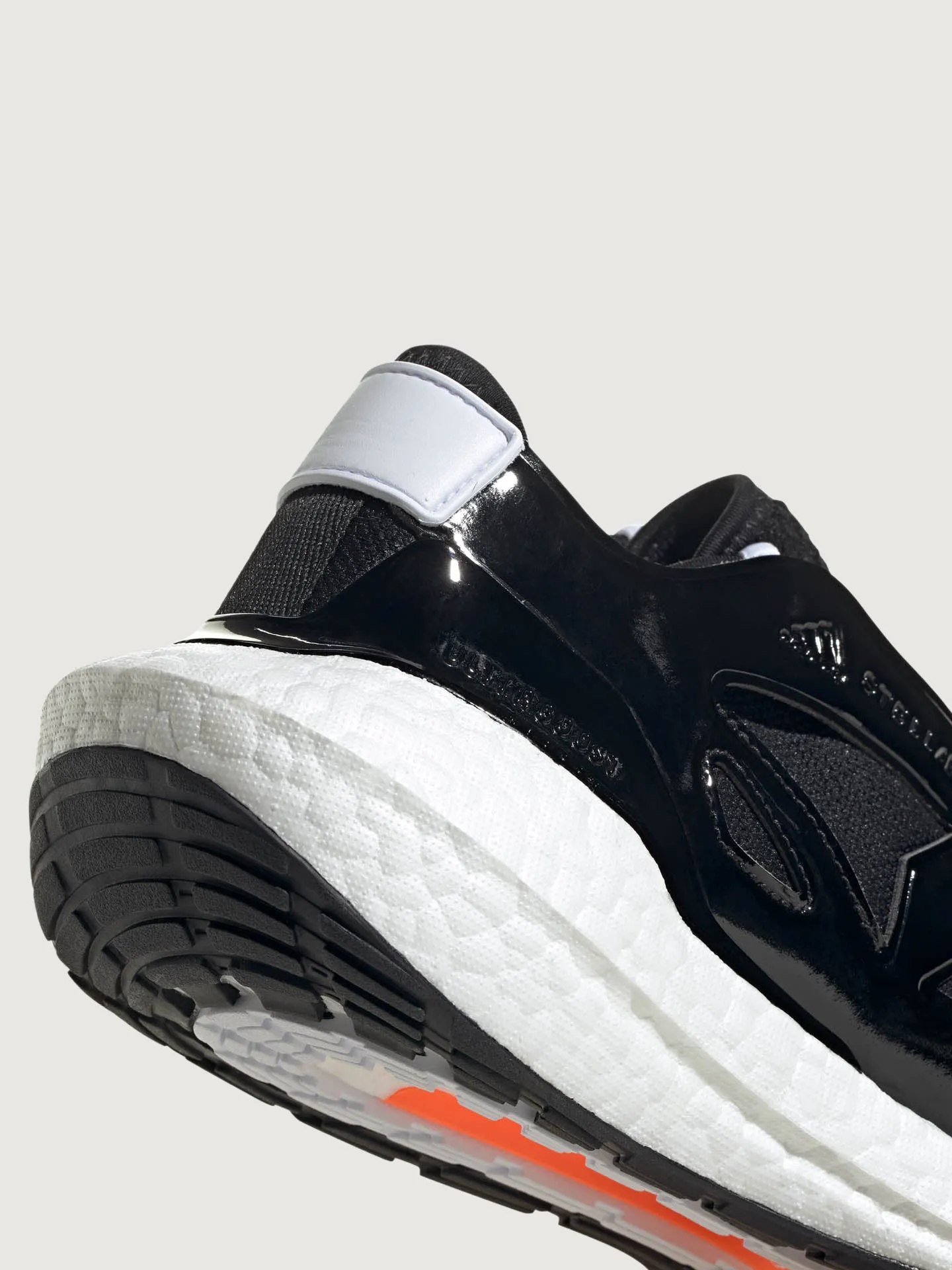 adidas by Stella McCartney ULTRABOOST 22 - CORE BLACK/FTWR WHITE/SIGNAL ORANGE